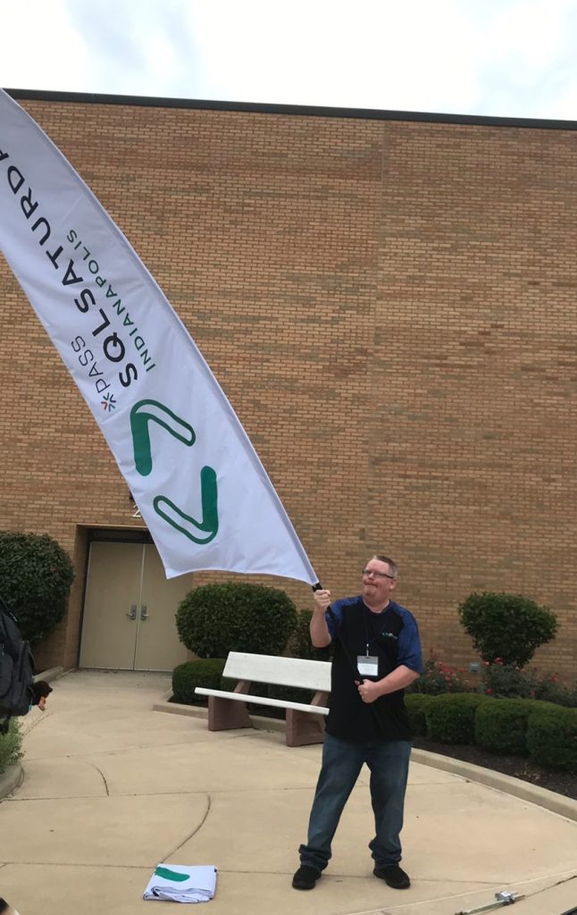 John Deardurff waving the SQL Saturday Indianapolis Flag